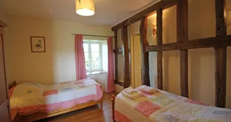 Gite" La Feuillardière" à Champagnac La Riviere en Haute-Vienne, chambre en bas deux lits_23 Gite" La Feuillardière" à Champagnac La Riviere en Haute-Vienne, chambre en bas deux lits_23